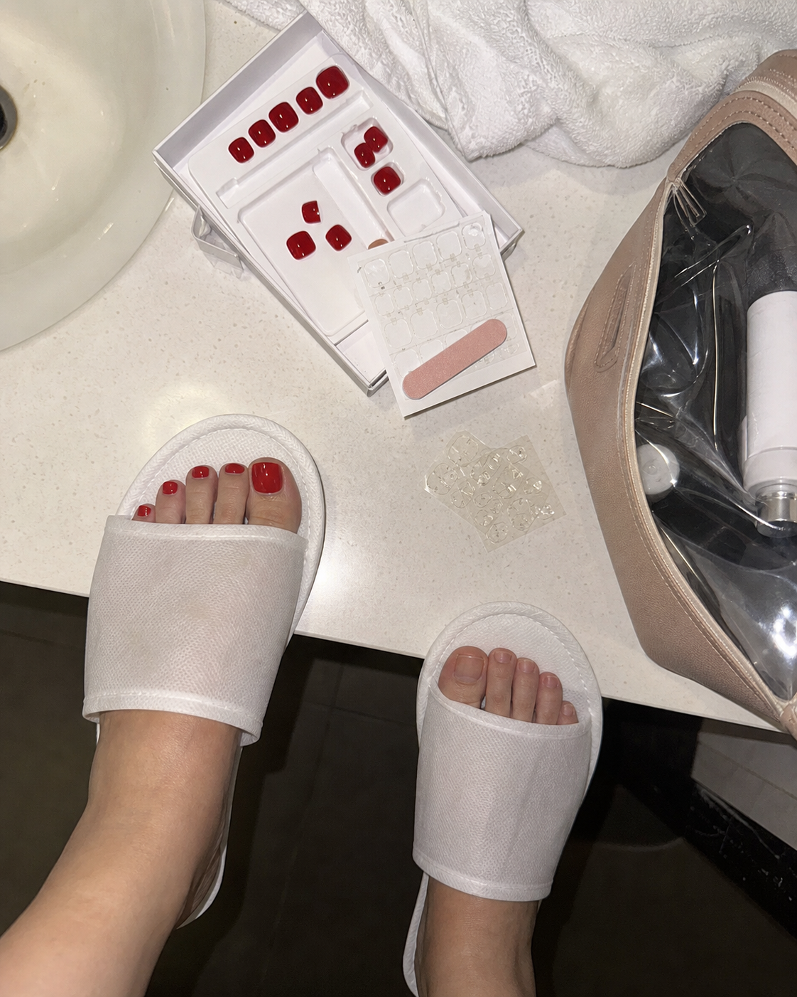 Hotel bathroom red nail kit photo